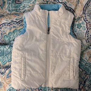 Girls reverse vest. You can wear inside out.